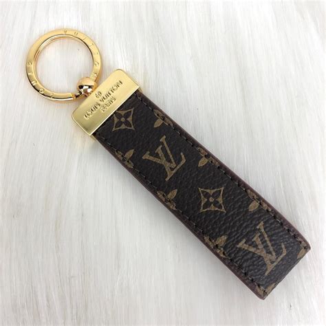 louis vuitton key charm replica|louis vuitton keychain men.